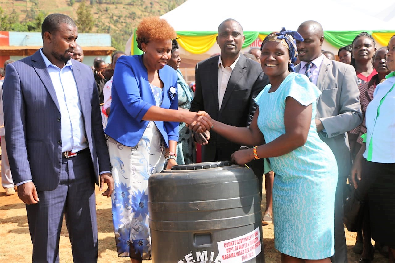 KARAMA WOMEN GROUPS RECEIVE 740 WATER TANKS AS THE COUNTY CELEBRATE WORLD WATER DAY.